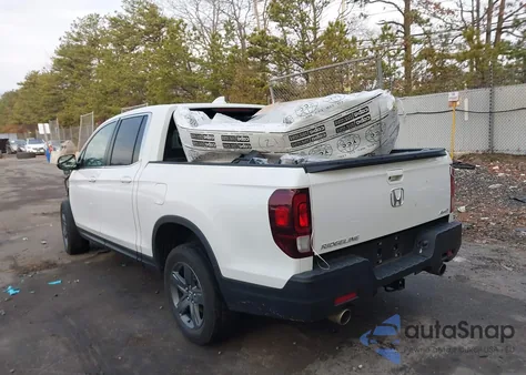 2023 Honda Ridgeline Rtl z USA, uszkodzony, nr VIN 5FPYK3F51PB055657